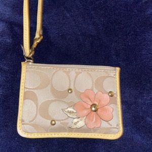 Small COACH wrist wallet.